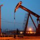 Oil prices struggle to retain gains amid trade war fears and profit-taking
